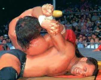 benoit stretches malenko in all sorts of awkward directions